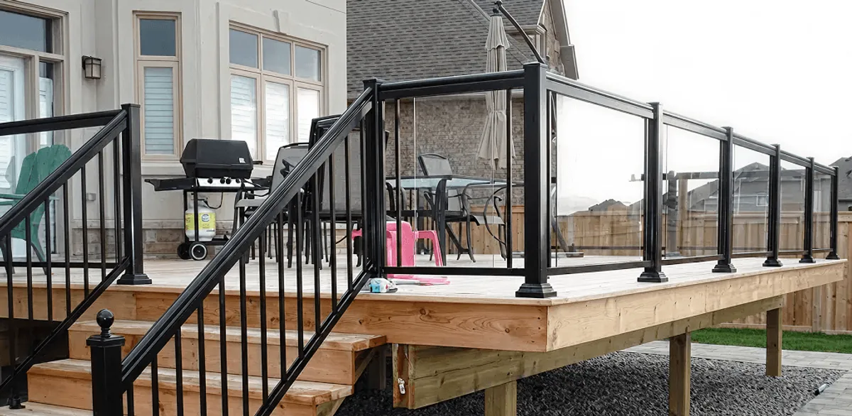 Handrail installation on a deck staircase for safety and code compliance in Toledo, OH